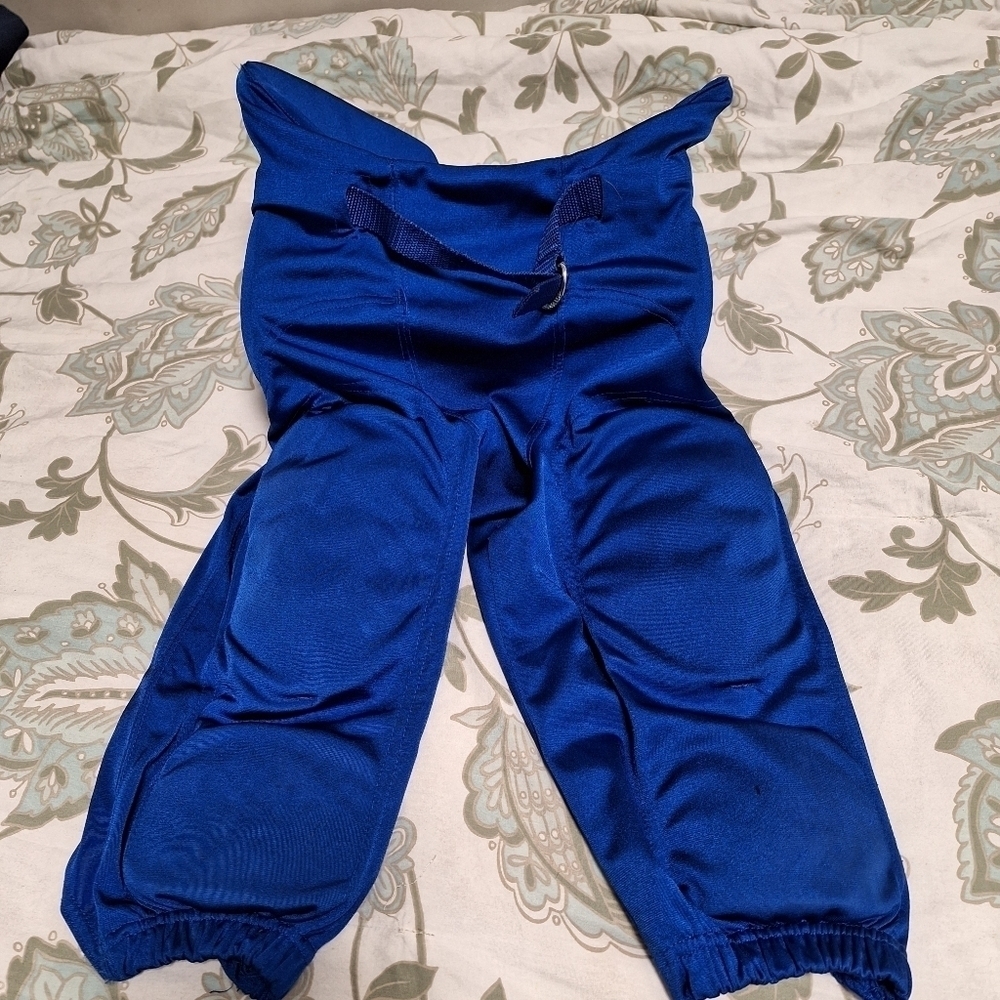 Champro adult medium football pants with pads in royal blue. Pre-loved